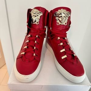 Rock star lifestyleRed & Gold Versace hi top sneakers.  #versace